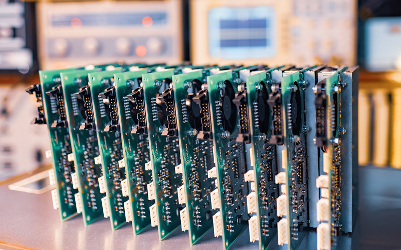 Stacked-printed-circuit-boards with-cooling-fans-for-thermal-management